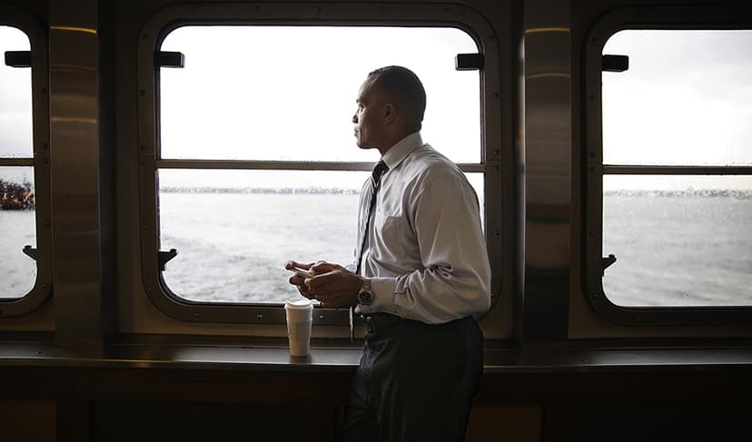 Man looking out of a window