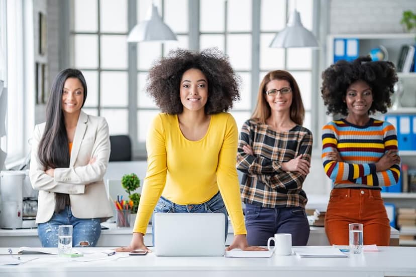 Women standing tall in an office