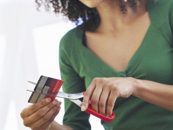 Lady cuts up credit cards