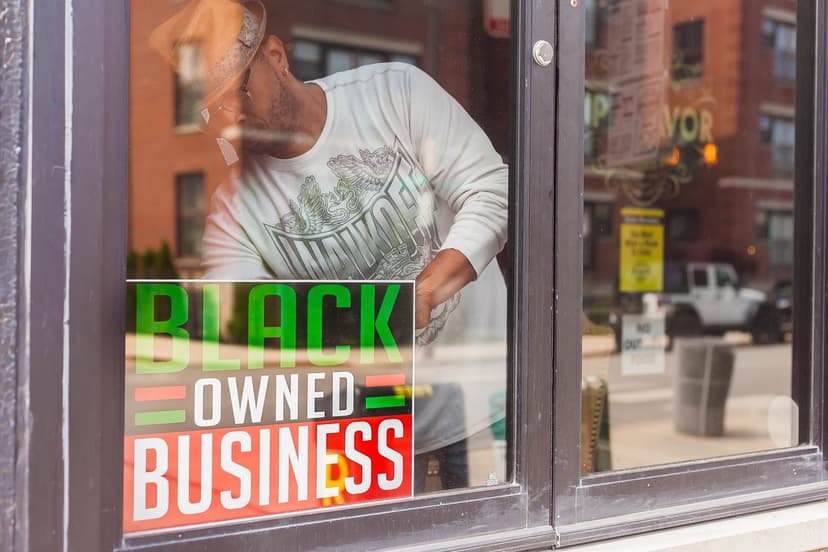 Man puts signage in store window