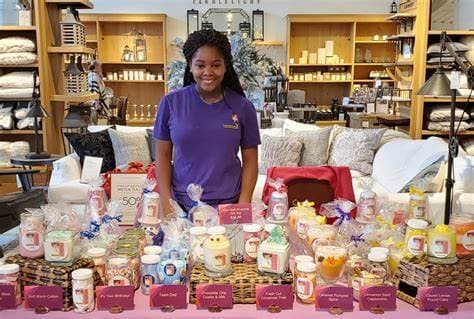 Little girl surrounded by candles