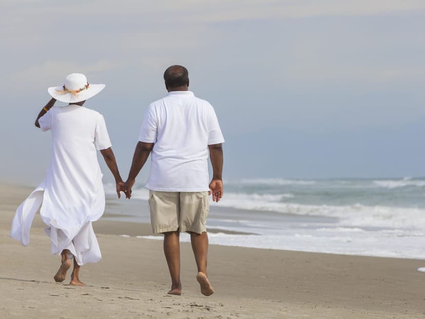 A couple walking on a beach