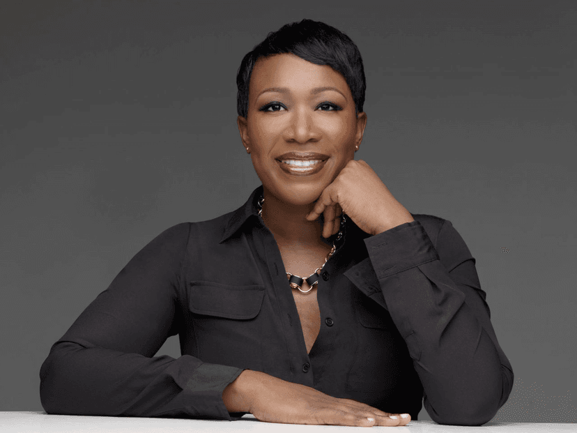 Joy Reid against a gray wall