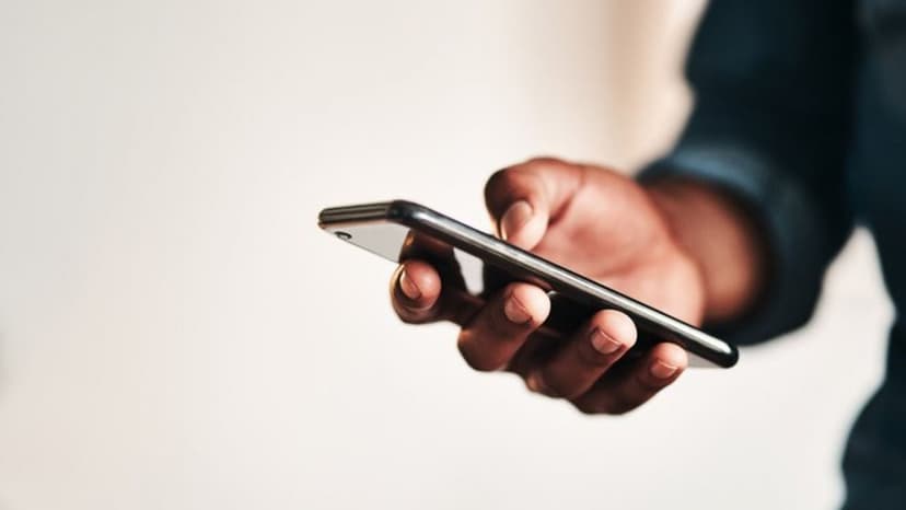 A man holding a cell phone