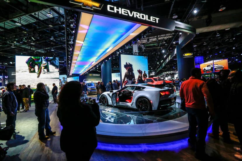 Cars lined up in a showroom