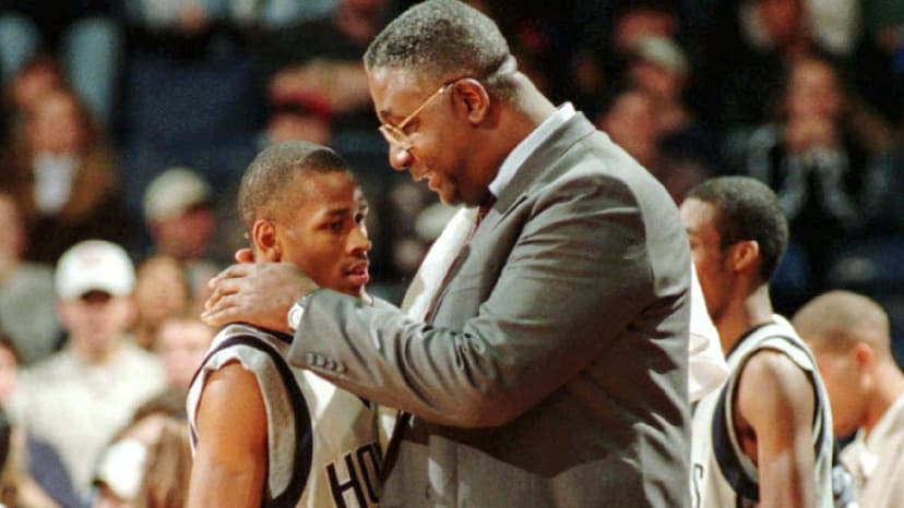 Coach and player on a basketball court