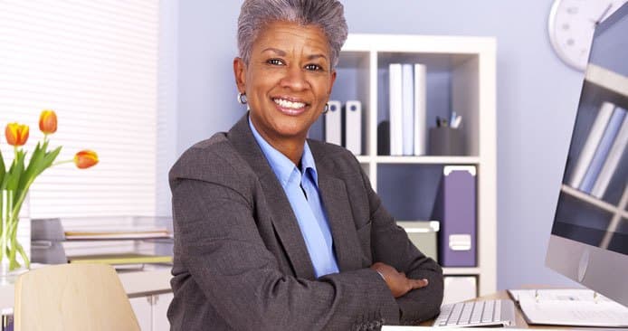 Lady with gray hair smiling