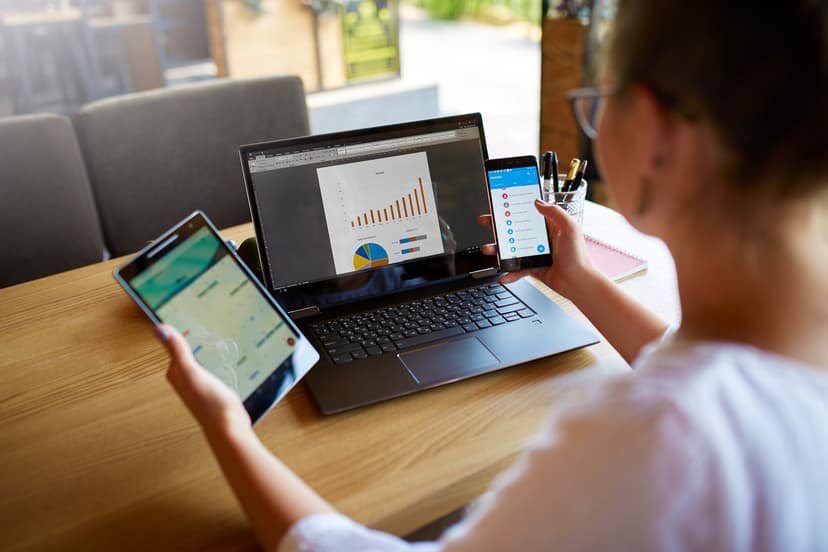 lady in front of calculator and laptop