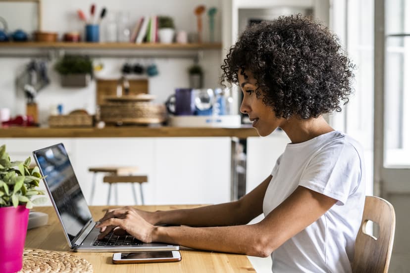 woman sitting at a desk working