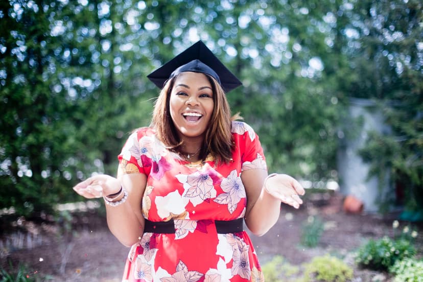 woman in a graduate hat smiling