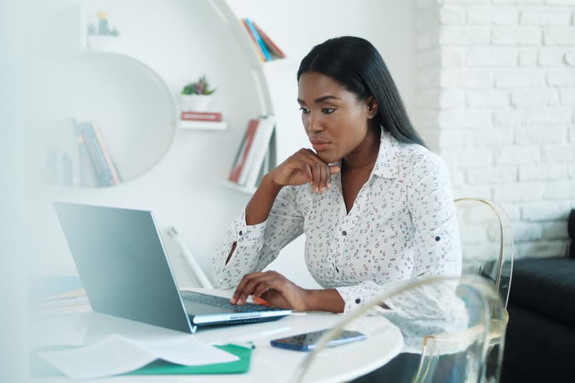 woman seated at a laptop