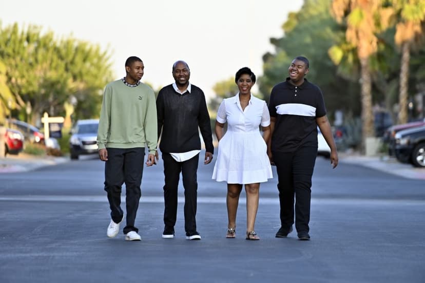 4 people walking in the street