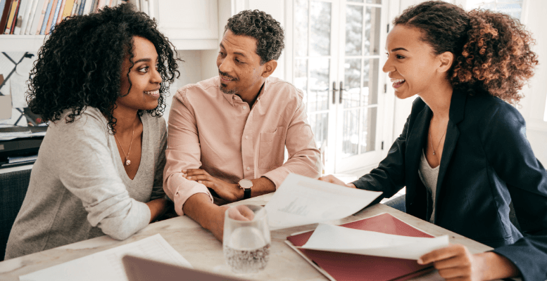 3 people seated at a table