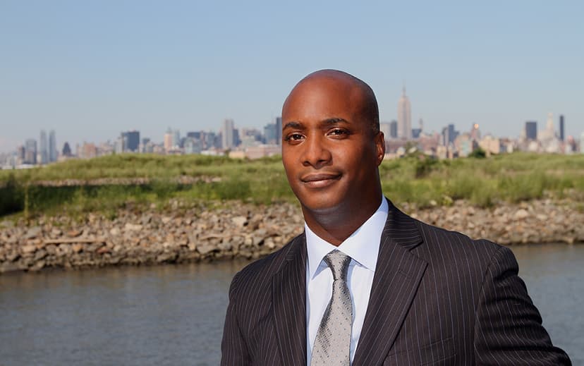 Man standing outdoors wearing a suit