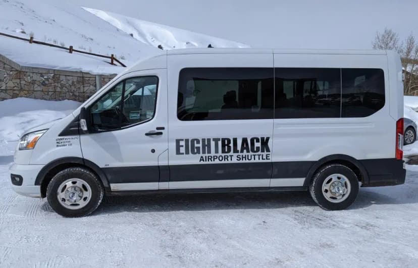 Eight Black Airport Shuttle