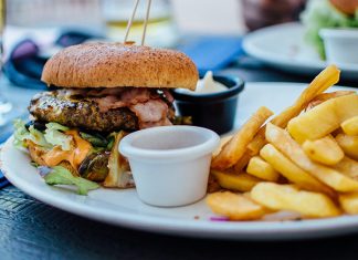 “White Burgers, Black Cash:” How Fast Food Went from Excluding to Exploiting Blacks
